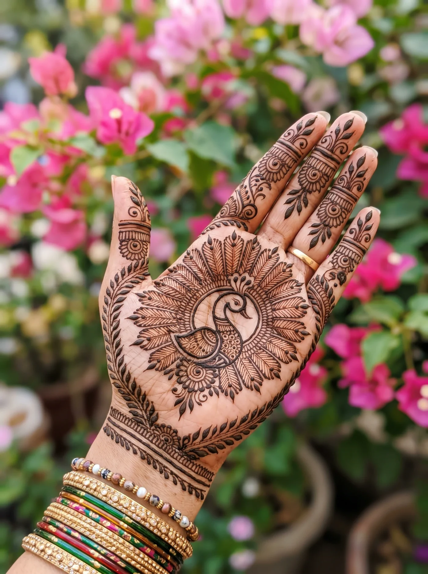Rajasthani palm mehndi design with a radial centerpiece