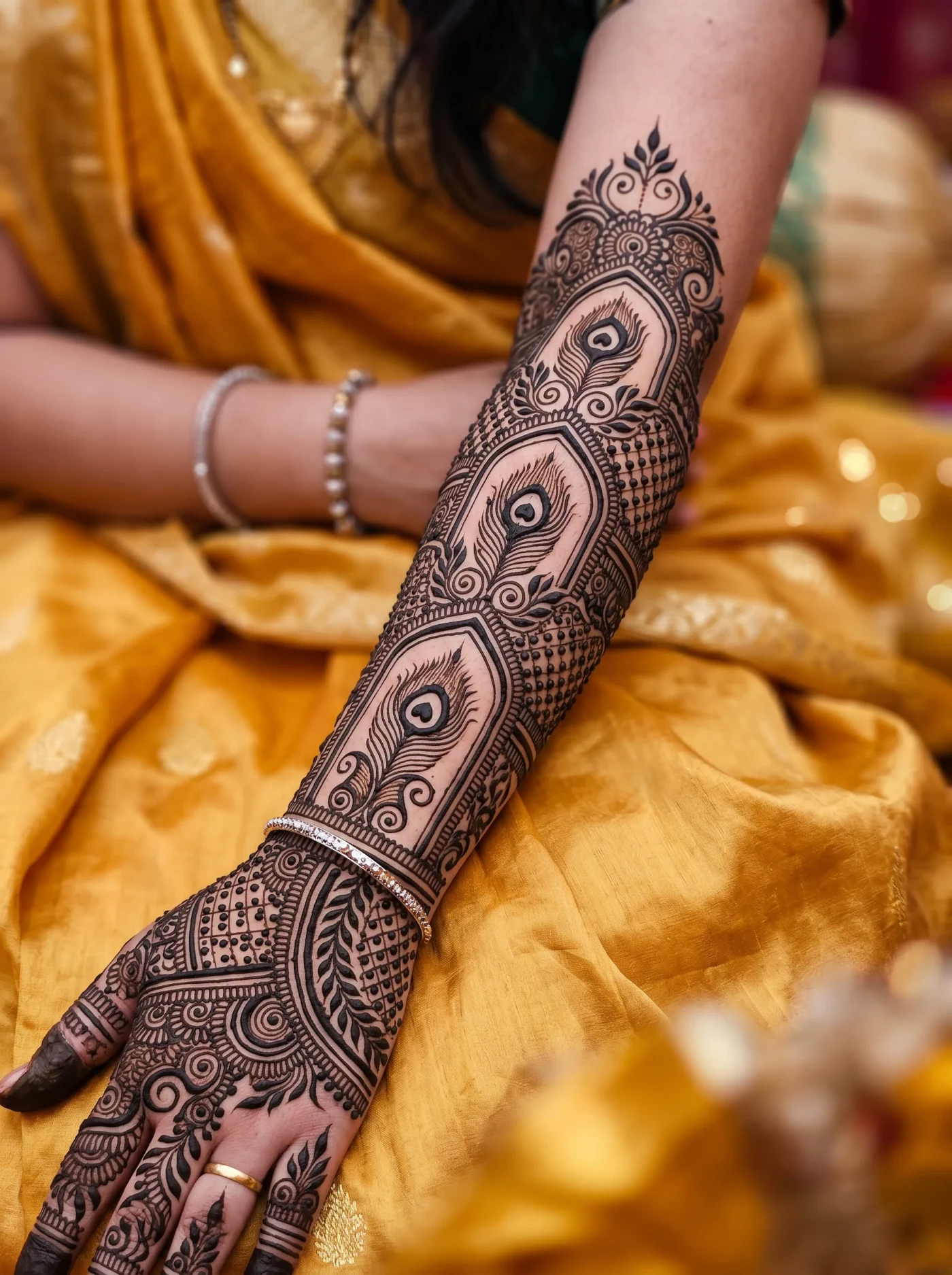 Traditional Rajasthani mehndi extending from wrist to hand